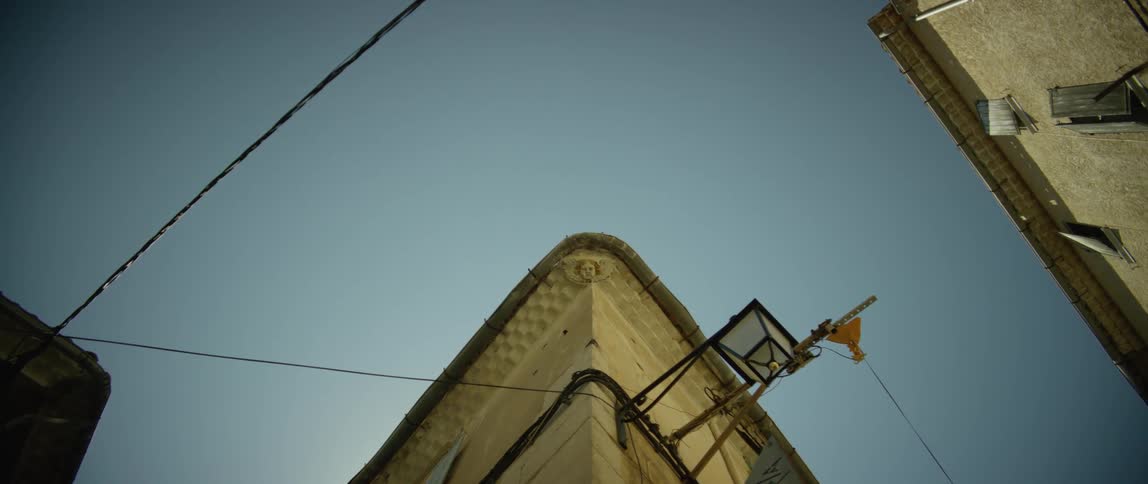 The exterior of the top of an apartment building