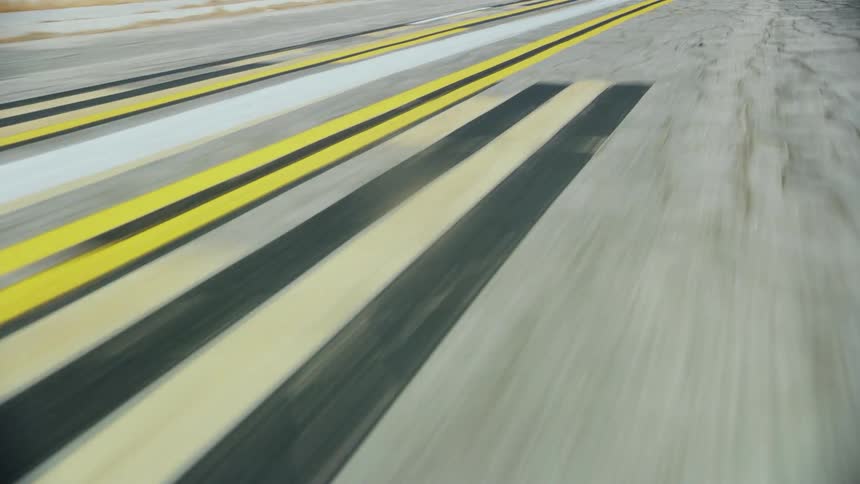A rural airstrip with lines painted on it