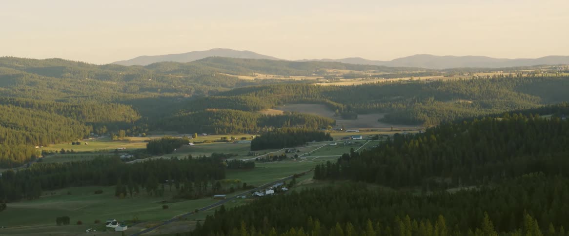 Aerial view of rural land at sunrise