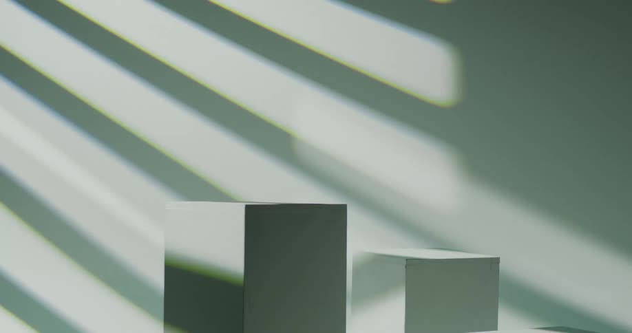 Flickering light forms patterns in blue and white over solid blocks