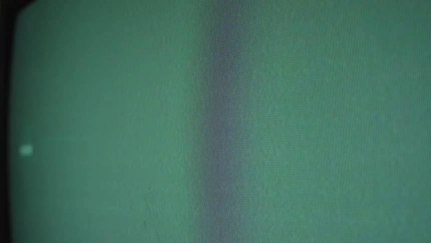 Broken graphics moving across a television screen