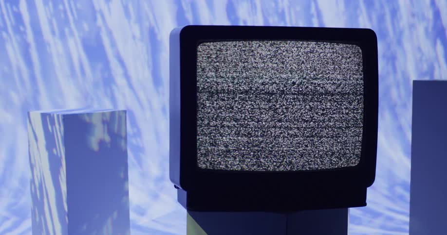 The static flashes on the television screen