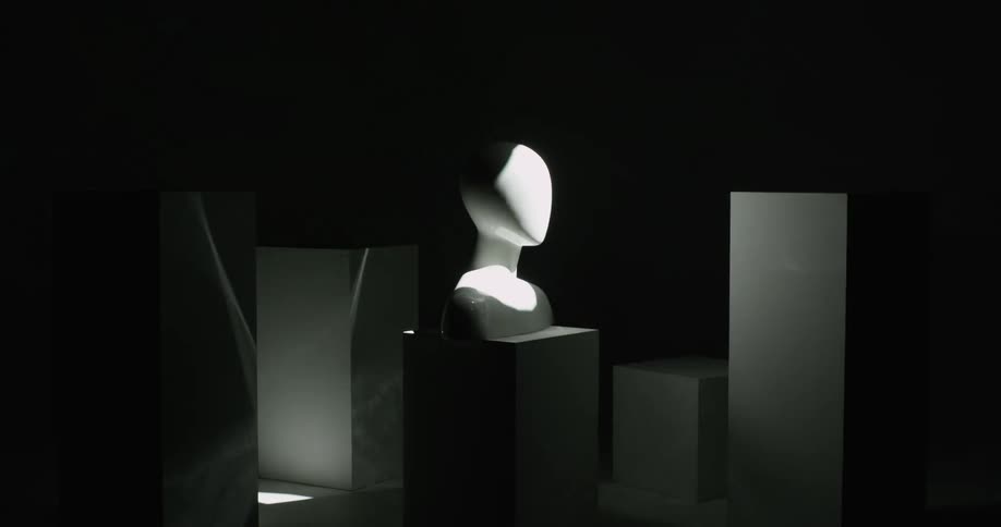 A spotlight runs over the art