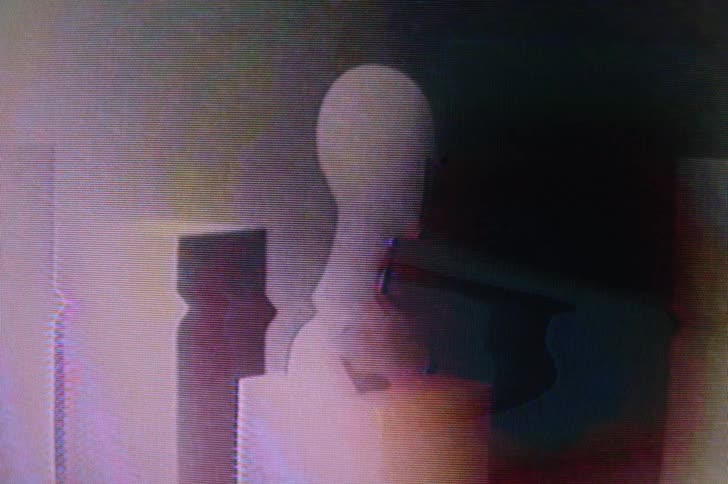 A view of a sculpture in a strobe light