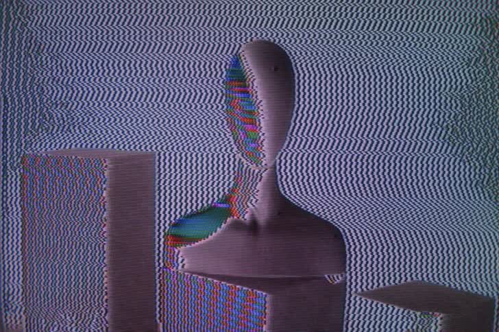 A staticky screen shows a human bust sitting on a short pedestal