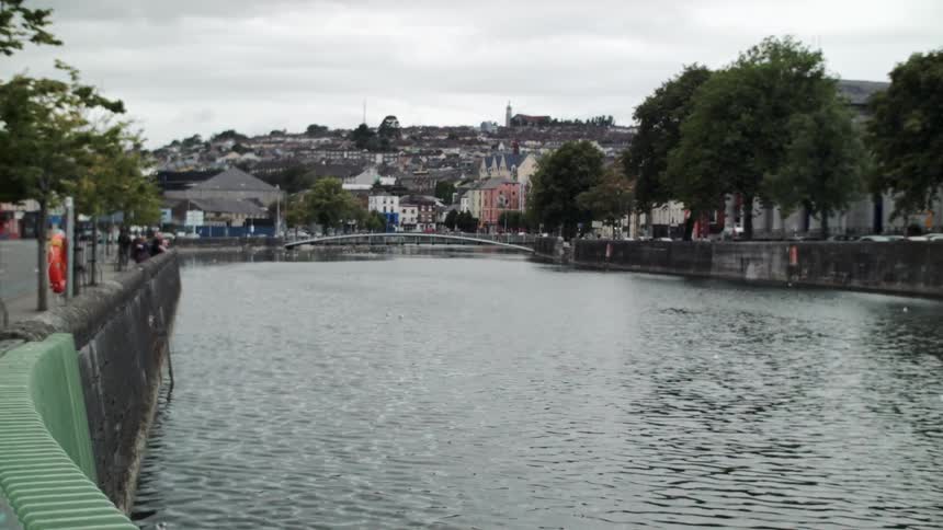 A river flows and ripples through a town