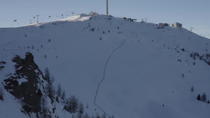 The ski lifts travel on the slope