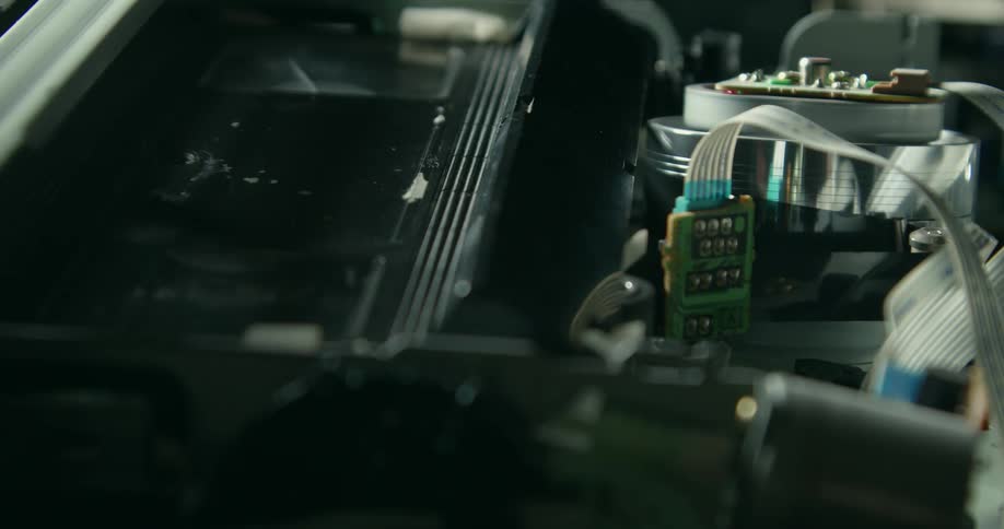 The vhs player ejects the tape