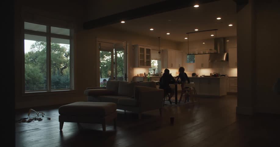 A mother and children in a house