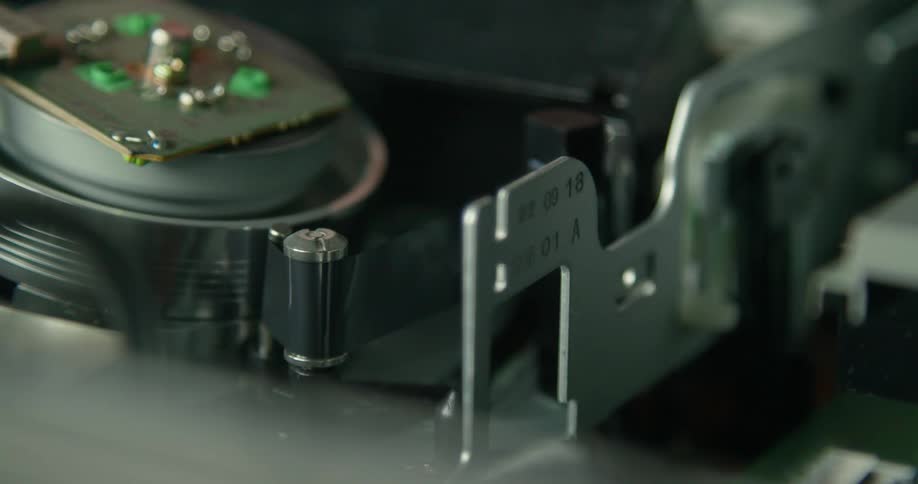Close up of a machine working as a belt spins on it