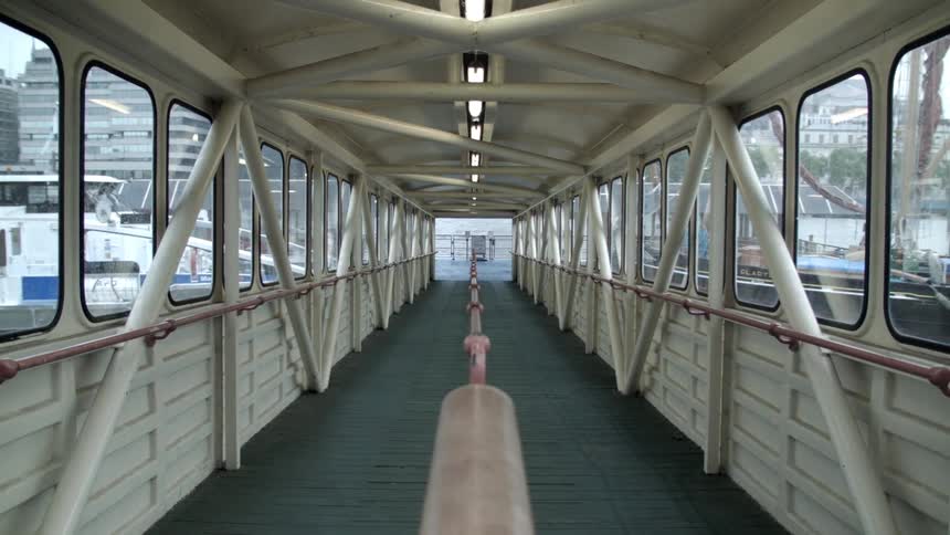 A walkway leads to the docks ahead