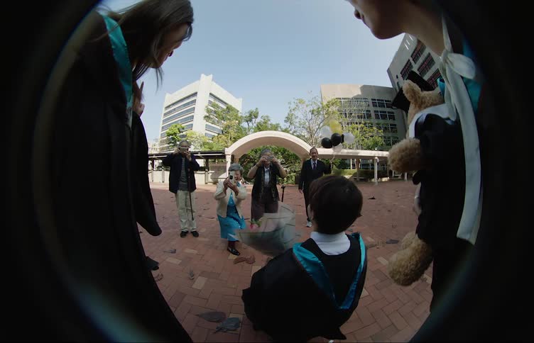 Graduates pose for pictures