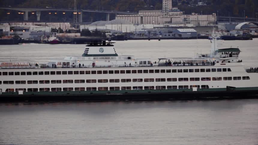 Ferry boat floating across a bay