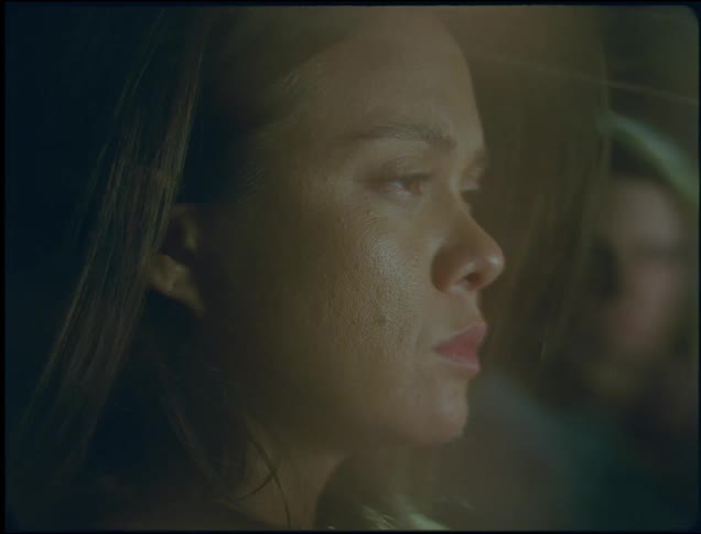A man watches a woman