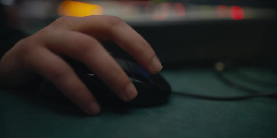 A person is browsing on a computer indoors