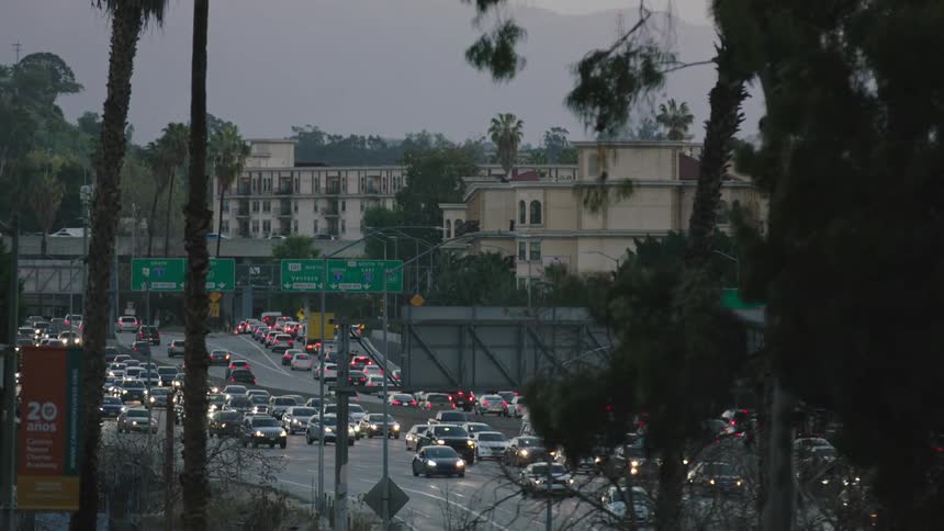 Cars driving on a busy city street