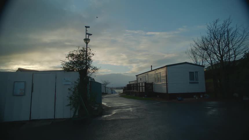 Houses in a rural area is displayed at dusk