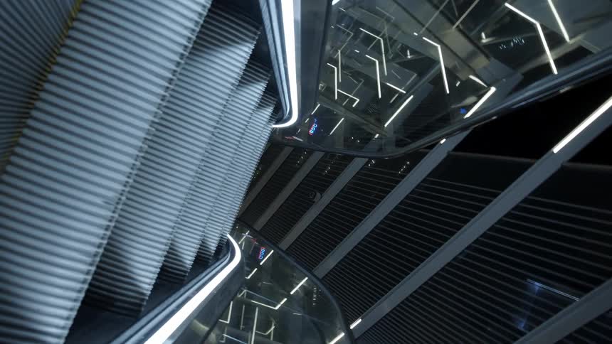The escalator is by the building