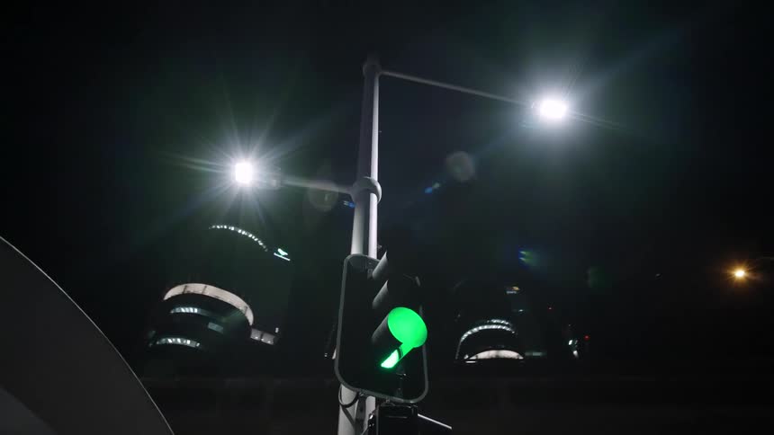 The traffic light is green in the city