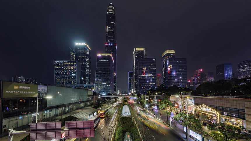 A view of traffic at night driving in a city