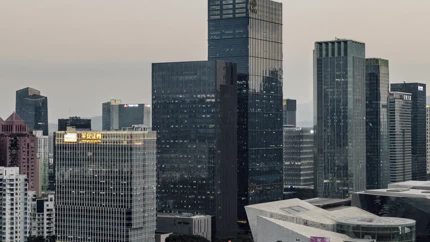 A time lapse shows a city come to life at night