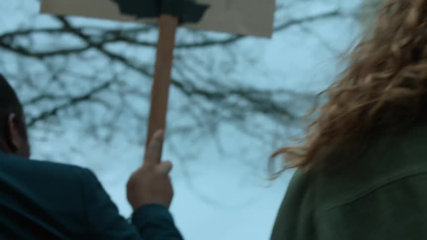 Protesters march outside