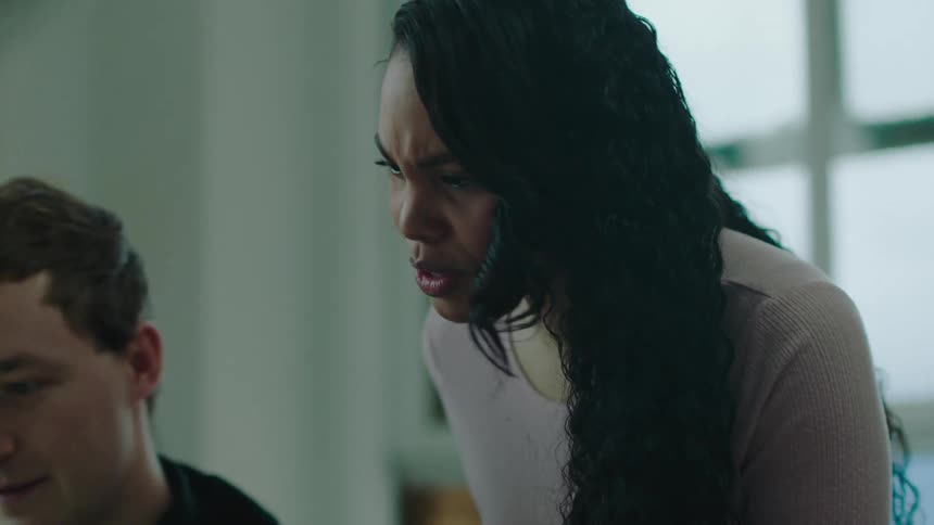 Man and woman are talking in a room together