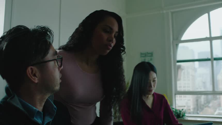 A group of people working in an office