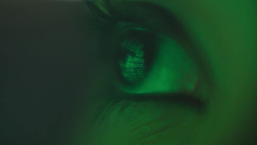 Words are reflecting off a persons eyeball