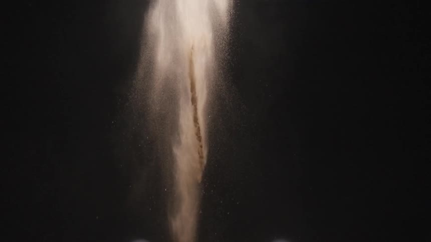 Sand falling in the air