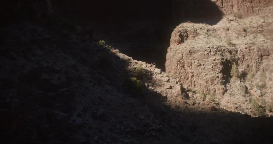 Part of mountain slope sits in shadow