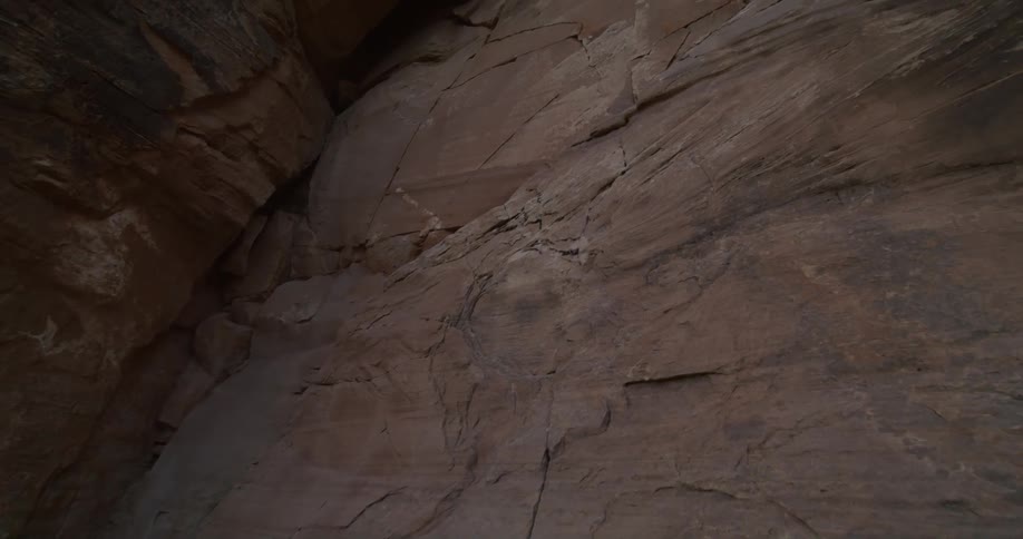 Stone inside a cave is cracked from years of erosion