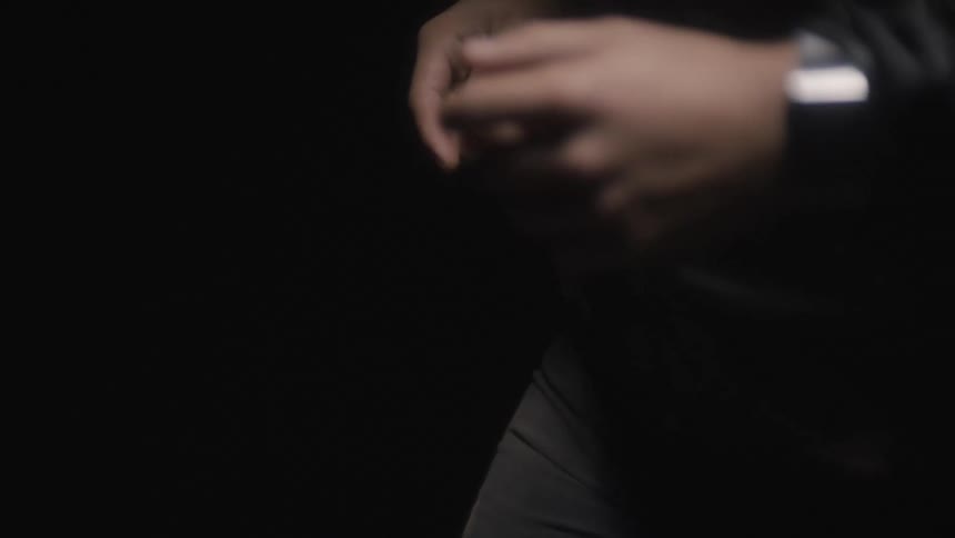 Close up of a mans hands as he runs