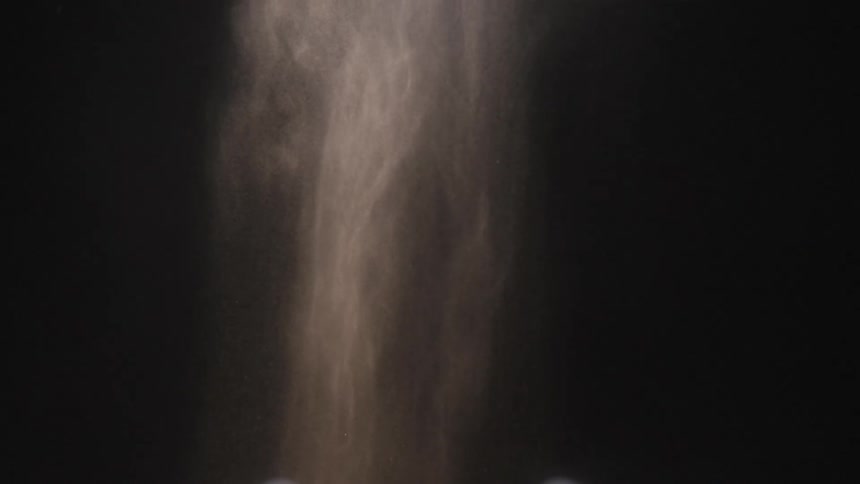 Rain falling from the night sky