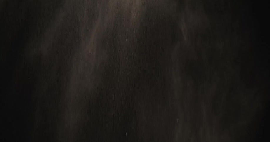 The dirt falls in the dark
