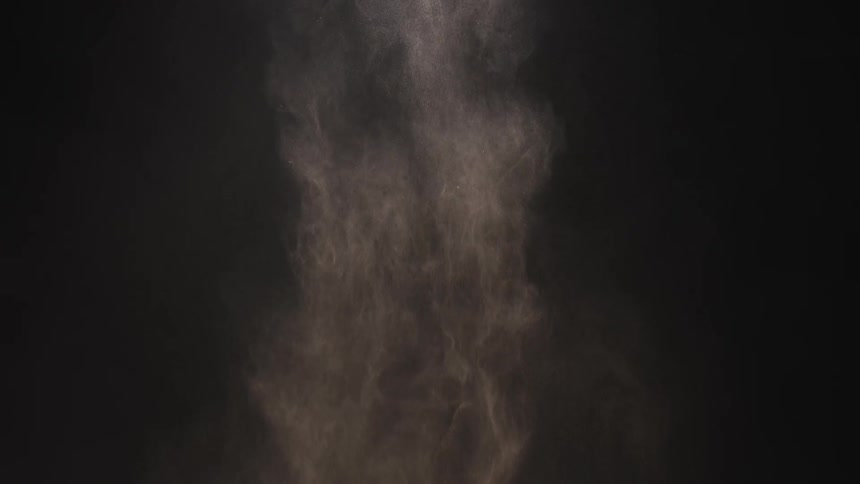 The dirt slowly falls in the dark