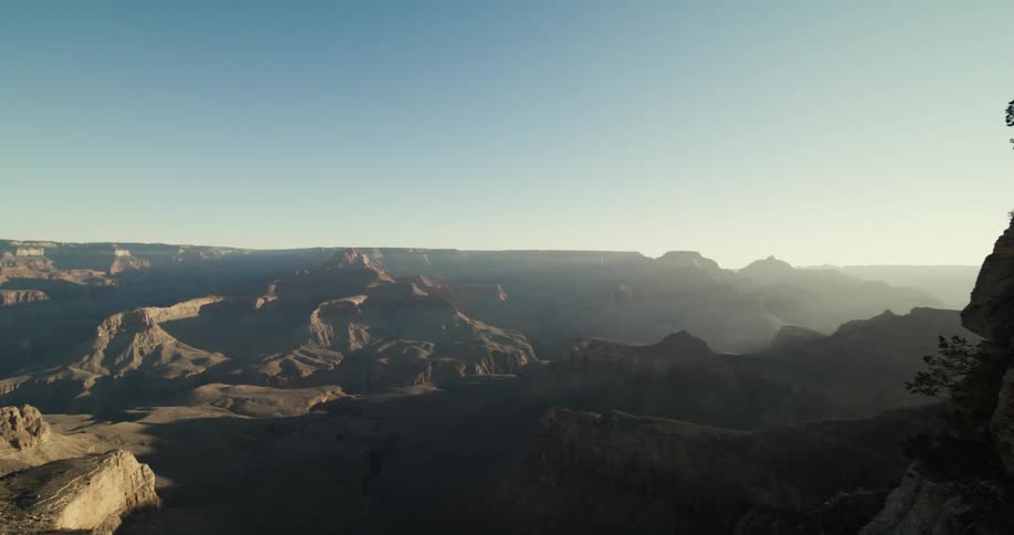 Sunlight and shadows on a vast canyon