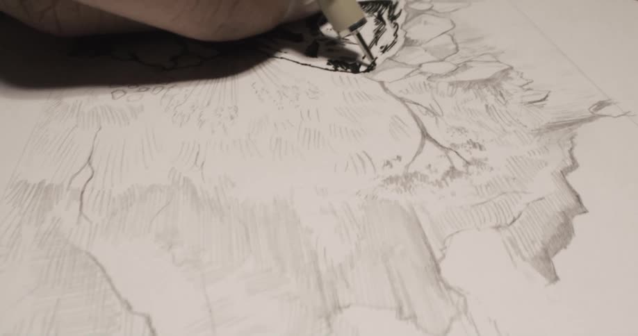 Close up of a persons hand as they sketch