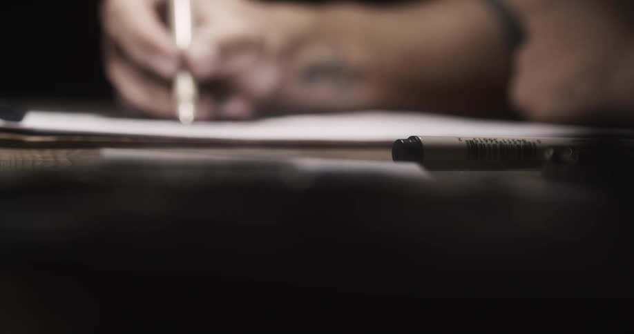 Artist draws on sketchpad