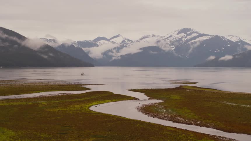 A view of mountains is displayed in the horizon