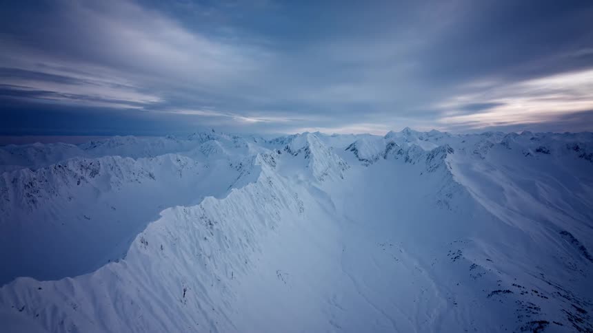Mountains are covered with thick snow
