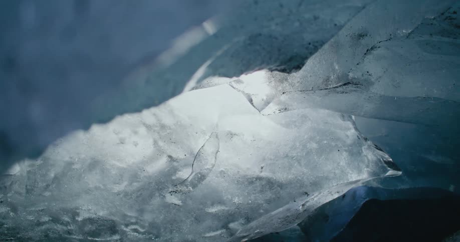 Water rapidly drips from ice as it is melting