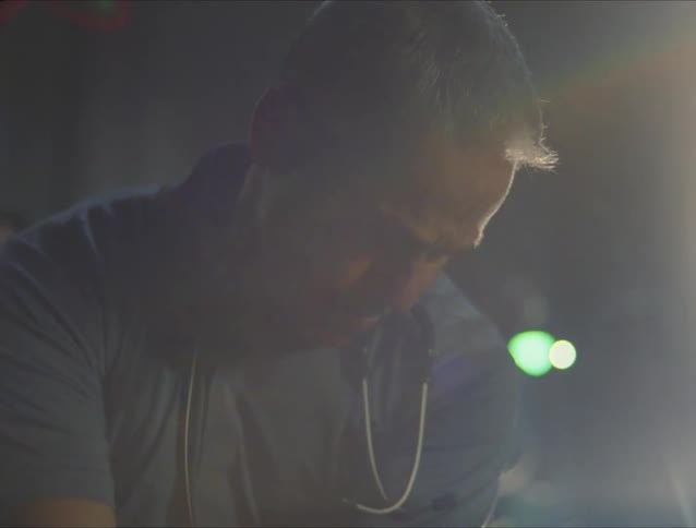 A paramedic is responding to an emergency scene at night