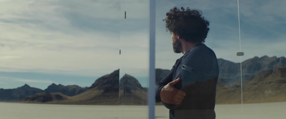 A man is trapped in the glass cell