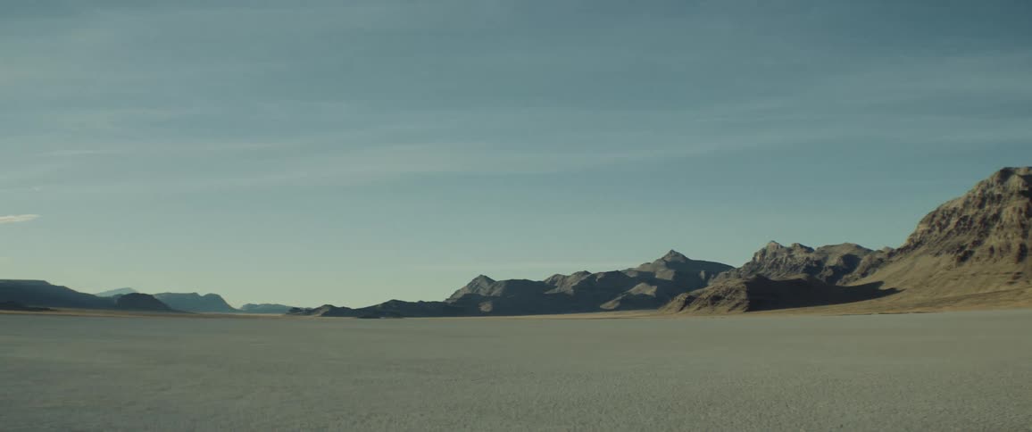 A barren plain in the badlands during the day