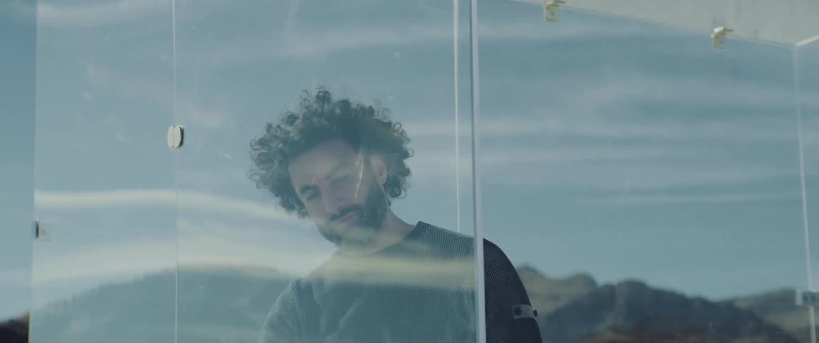 A man is trapped in the glass cage