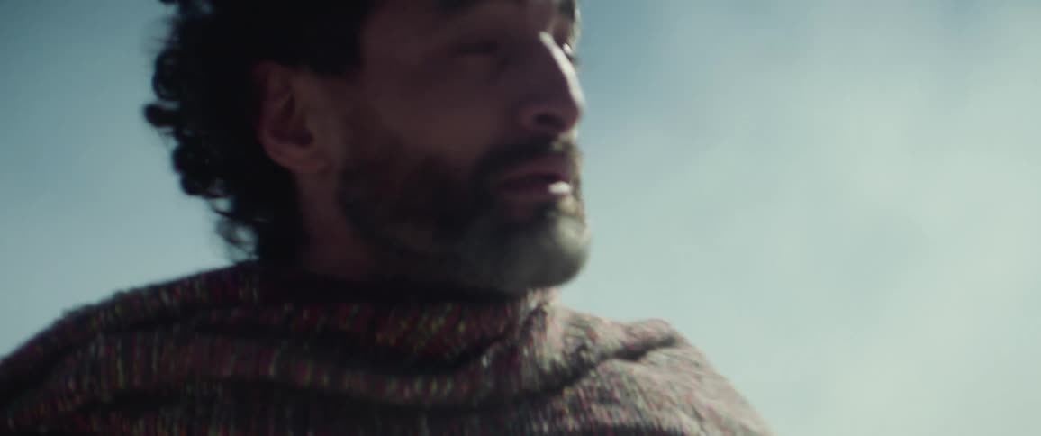 A man screams as he looks around himself