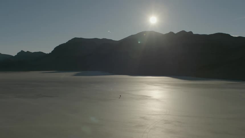 Aerail view of person walking in the desert