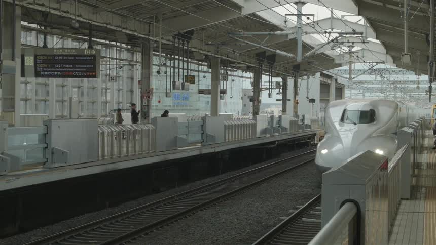 Train coming into a train station