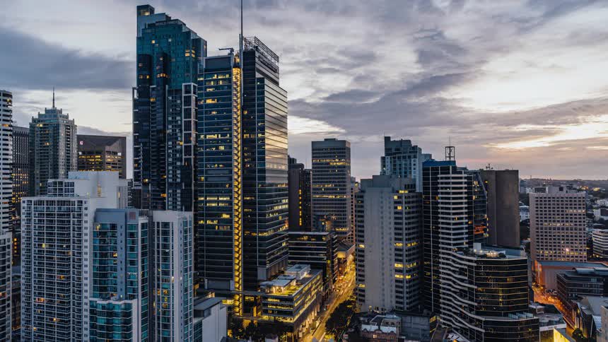 Time lapse view of a downtown city is displayed